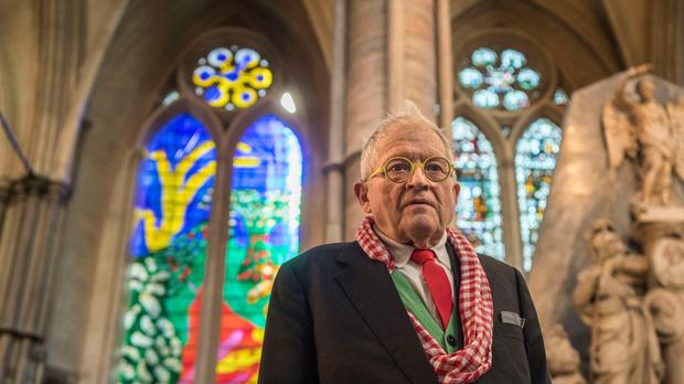 David Hockney in front of The Queen’s Window, stained glass window at Westminster Abbey he designed (Victoria Jones/PA)