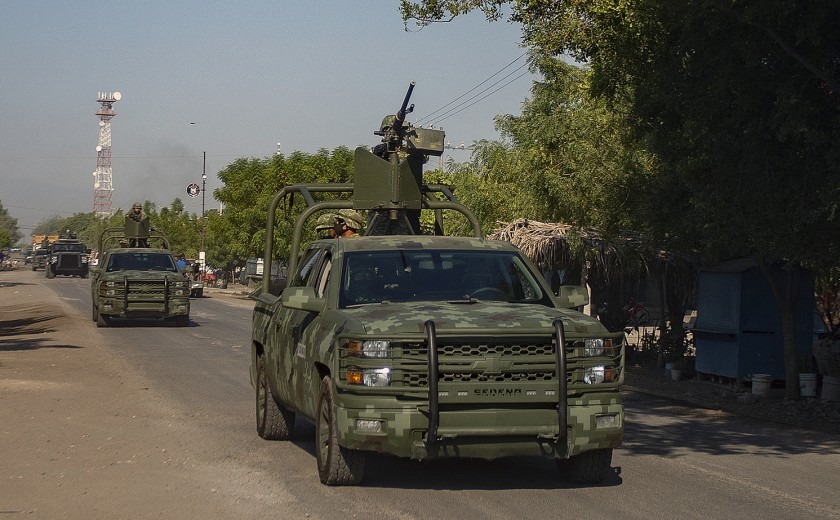 A convoy of vehicles from the Mexican Army patrol during the visit of Monsignor Franco Coppola in Aguililla community, state of Michoacan, Mexico on Friday.(Enrique Castro / AFP / Getty Images)