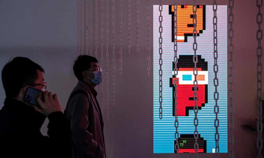 One of the world’s first exhibitions of blockchain art – Virtual Niche: Have You Ever Seen Memes in the Mirror? – was held in Beijing in March. Photograph: Nicolas Asfouri/AFP/Getty