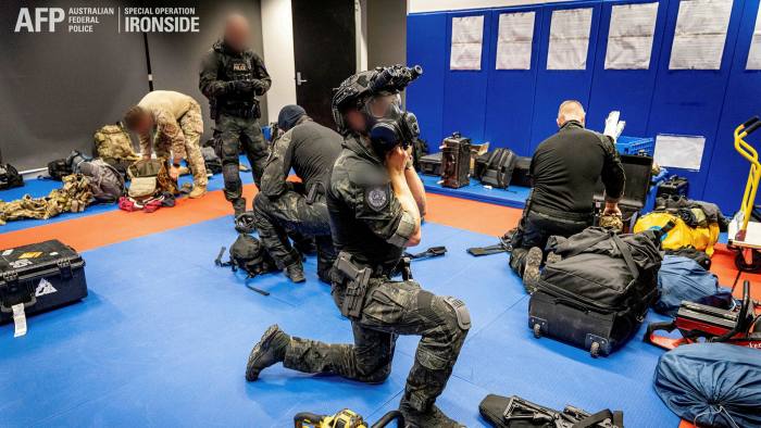 Members of the Australian Federal Police are seen during Operation Ironside against organised crime. Ironside is the Australian counterpart of the global covert operation © Australian Federal Police/Handout via REUTERS