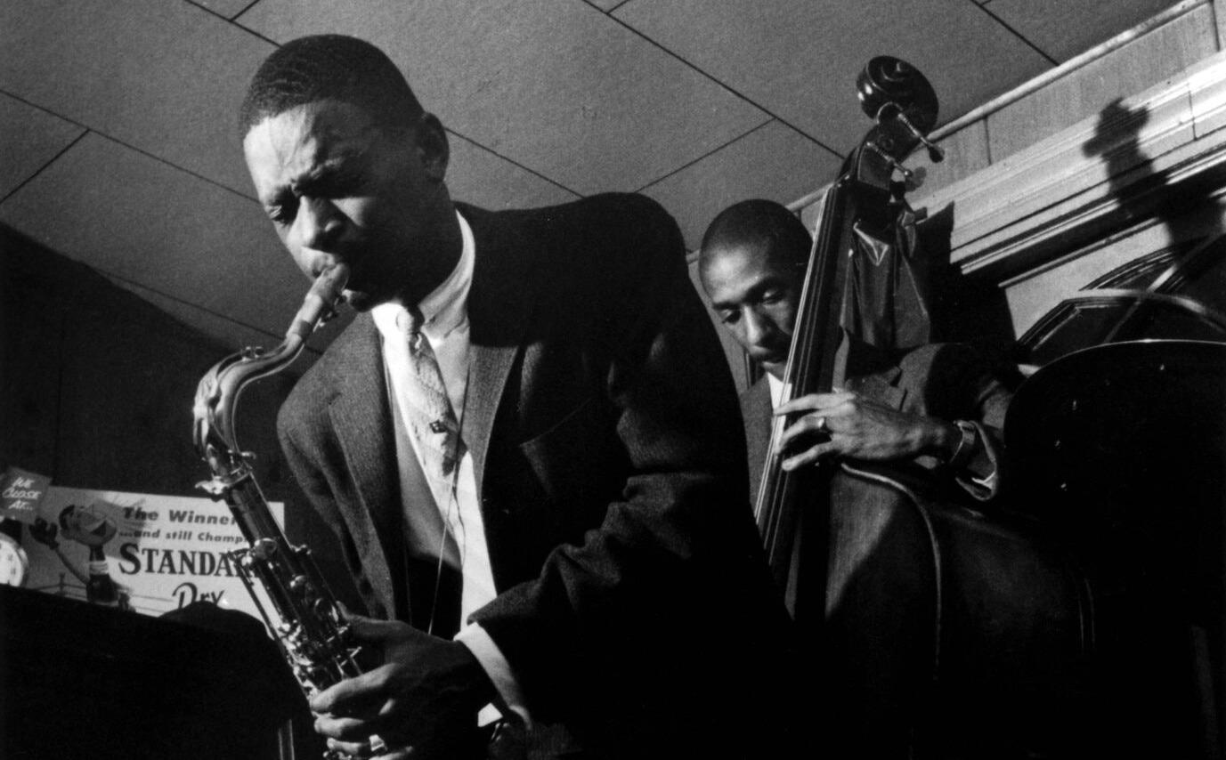 Pee Wee Ellis performing in Rochester, N.Y., in 1958 with Ron Carter on bass. Mr. Ellis bridged jazz and funk, and brought his fusion sensibility to James Brown’s band as an arranger and composer.Credit...Paul Hoeffler/Redferns, Getty Images