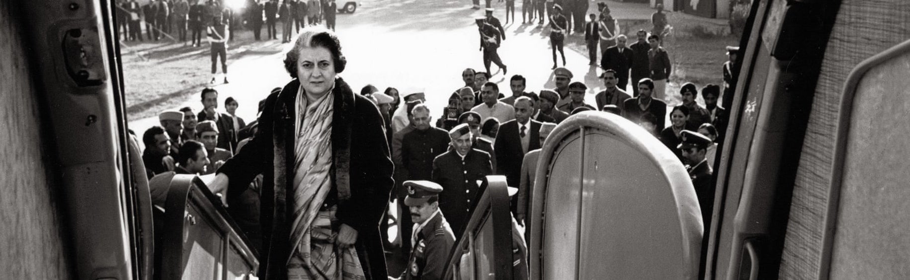 Indira Gandhi boarding a plane, New Delhi, 1972. Photograph: Marilyn Stafford (cropped)