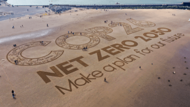 Sand artwork adorns New Brighton Beach in the UK in May 2021. Christopher Furlong/Getty