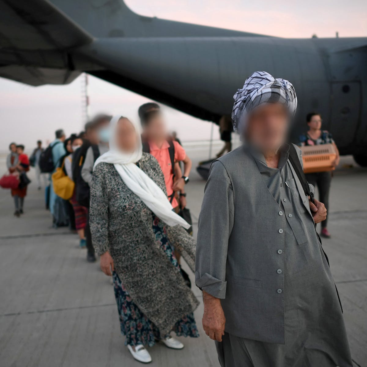 Evacuees from Kabul on their way to Poland via Uzbekistan. Marcin Obara / EPA-EFE