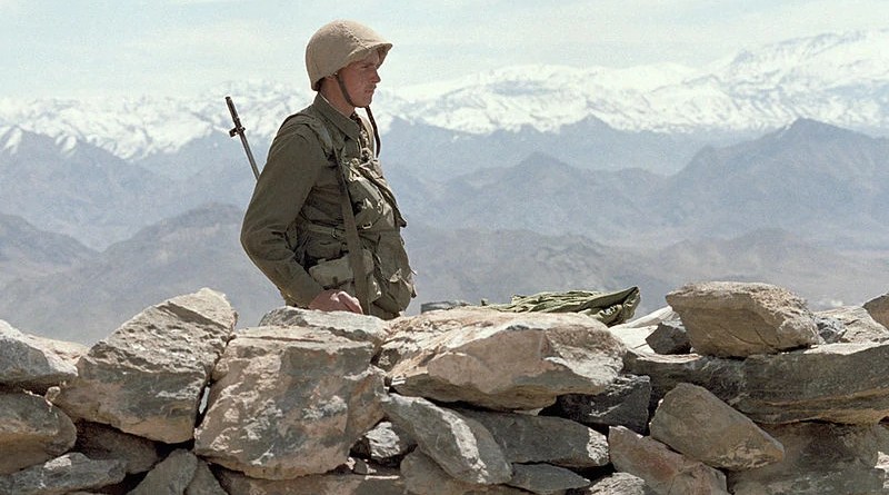A Russian soldier-internationalist guards roads during the Soviet-Afghan War. Photo Credit: RIA Novosti, Wikipedia Commons.
