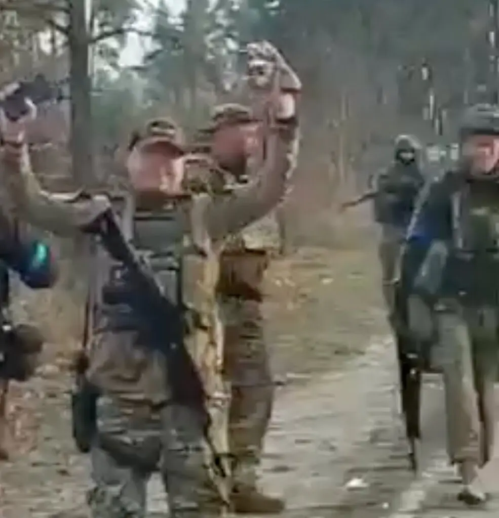A still frame from a video posted online on Monday shows Ukrainian soldiers at the scene where Russian soldiers were executed around March 30.Credit...VOENACHER via Telegram