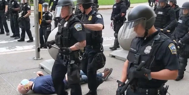Martin Gugino bleeds on the sidewalk after being shoved by two Buffalo police officers June 4, 2020, in Buffalo, New York. Video screengrab via WBFO