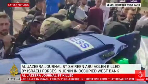 Shireen Abu Akleh body is carried through the streets of Jenin