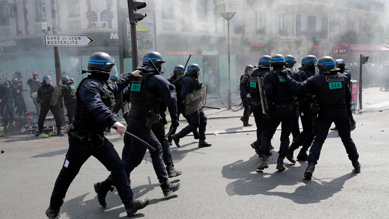 Riot police at a May Day demonstration march in Paris (Lewis Joly/AP)